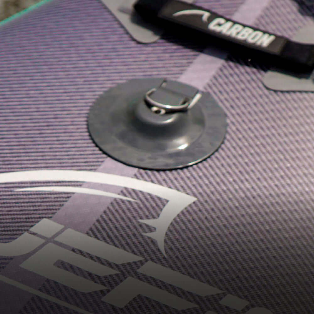 Inflatable paddleboard with textured surface, center fin, and inflation valve detail