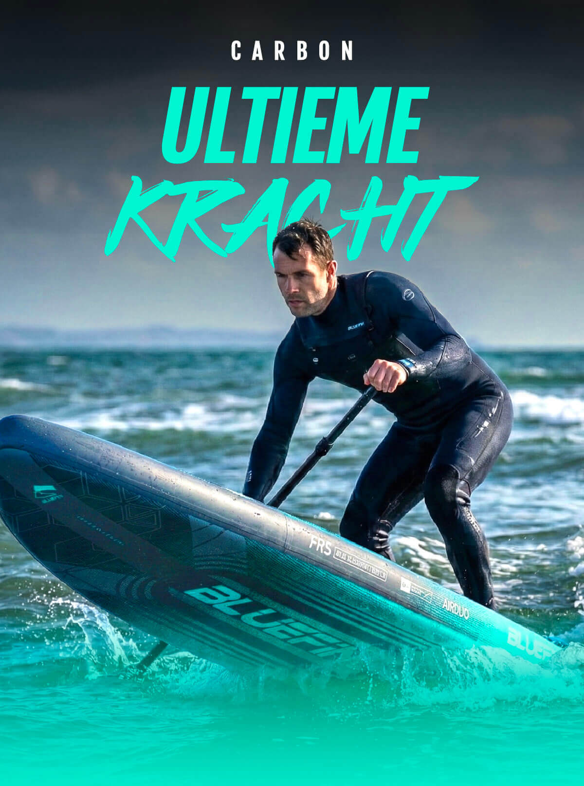Man in wetsuit paddling a Bluefin inflatable paddleboard on ocean waves