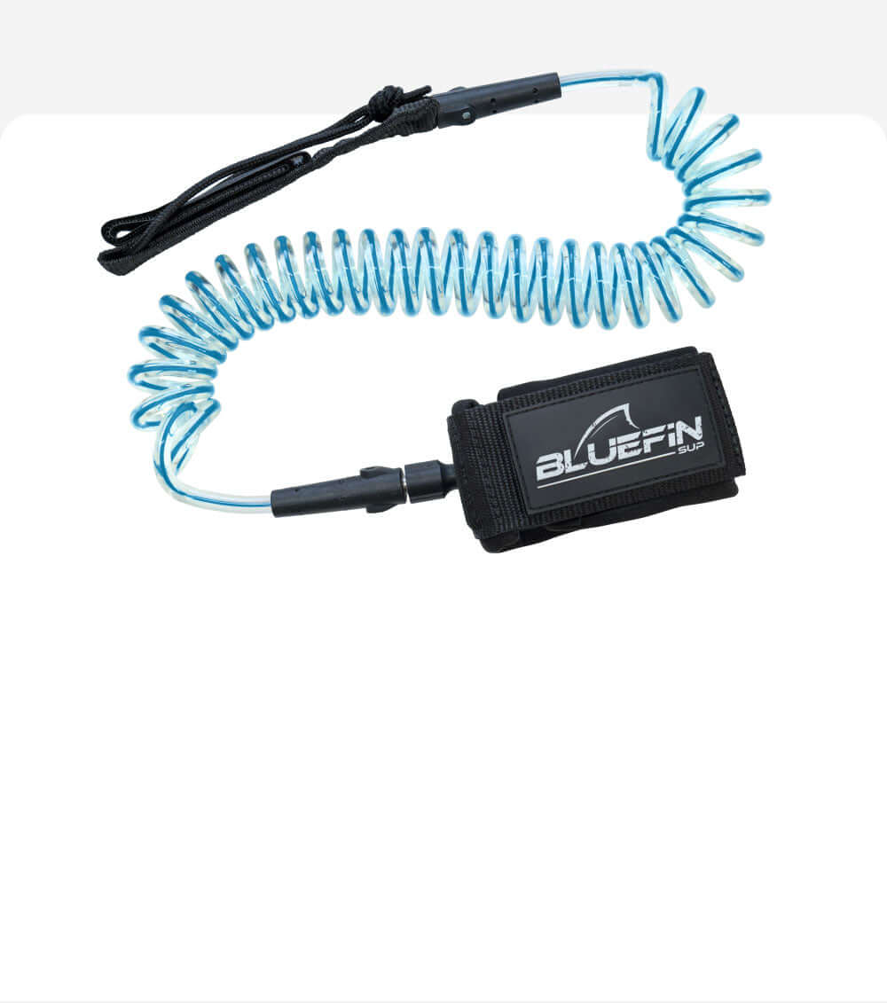 Coiled blue safety leash with black strap and BLUEFIN SUP logo for paddleboarding