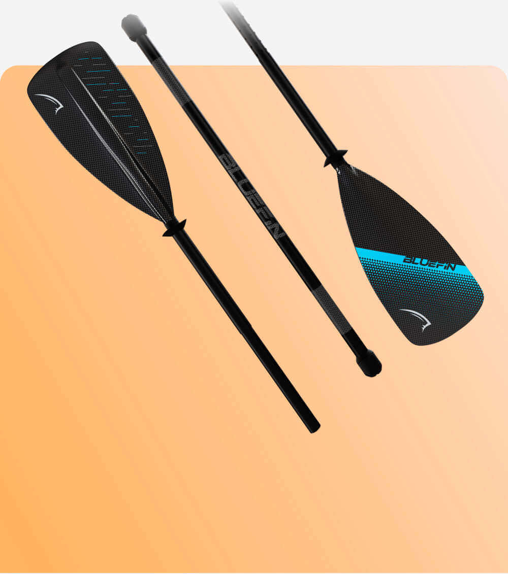 Black paddle with textured blade, blue accents, and adjustable shaft on an orange background