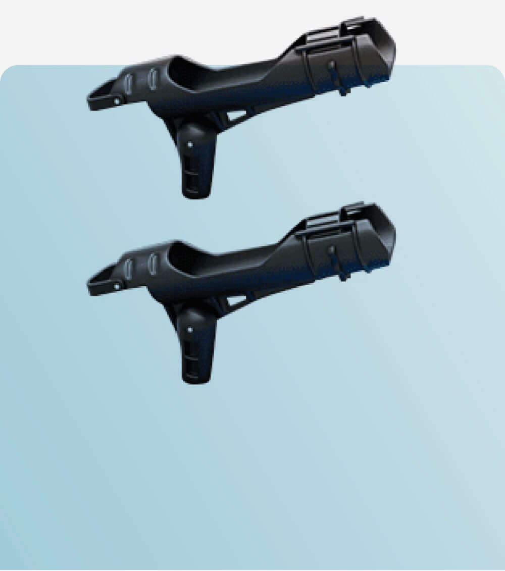 Two black paddleboard fin boxes positioned on a light blue background